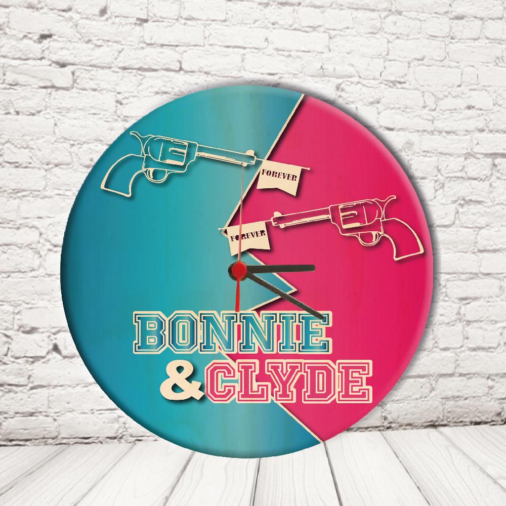 OROLOGIO CERCHIO ''BONNIE E CLYDE PISTOLE''