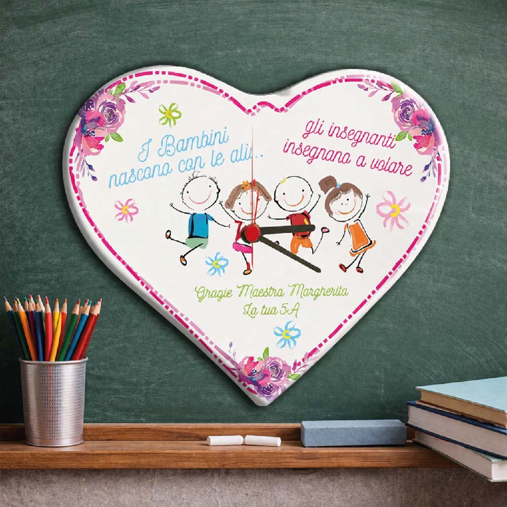 OROLOGIO IN LEGNO MAESTRA ''INSEGNANO A VOLARE'' CUORE